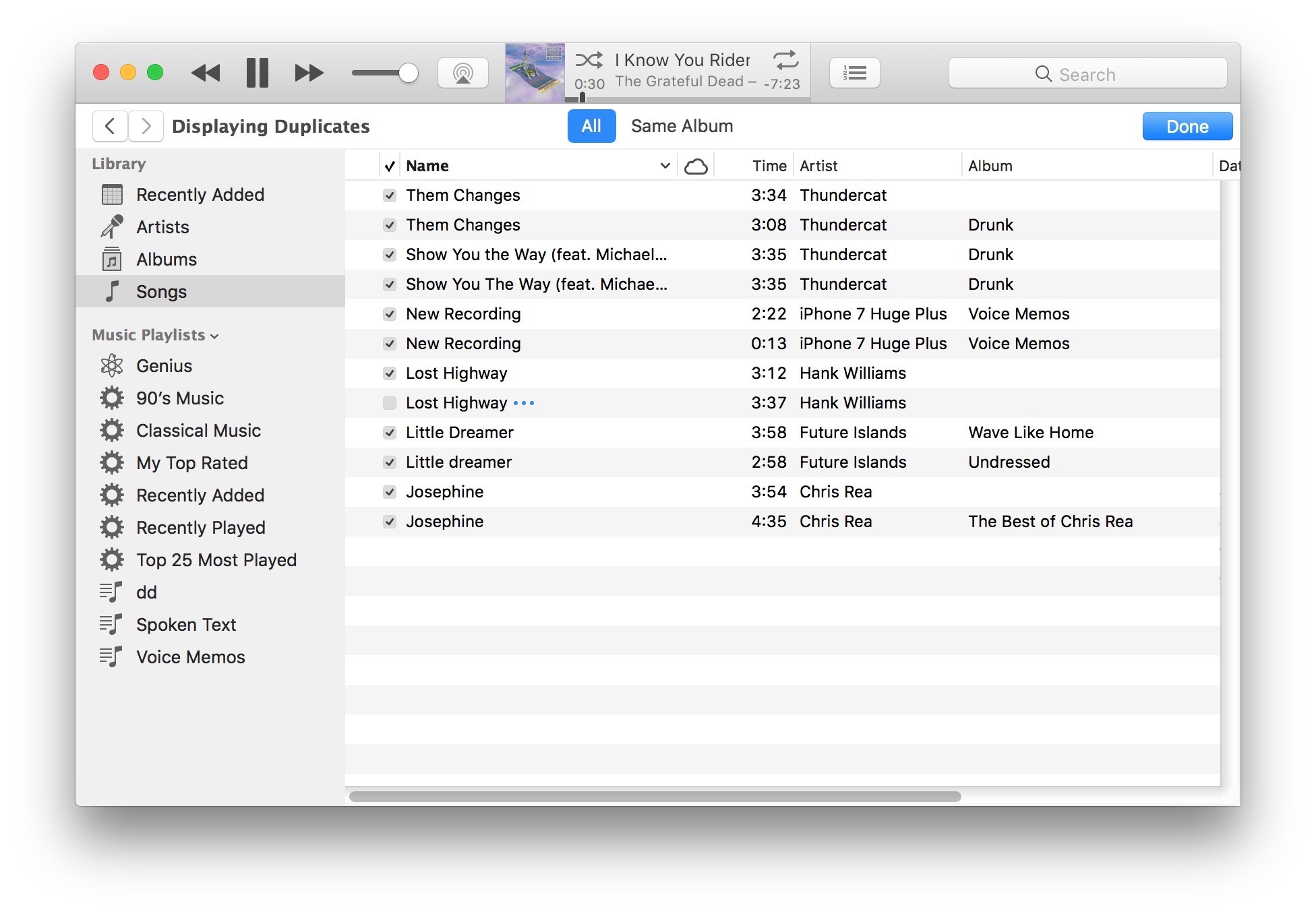 Список потенциально повторяющихся песен, найденных в iTunes